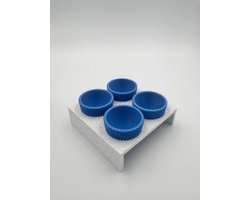 4 blauwe 3d geprinte eierdopjes in houder. Marmer look houder met 4 eierdopjes in stijl.