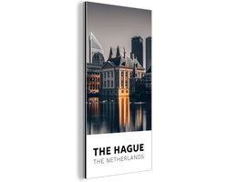 Aluminium schilderij 20x40 cm - Wanddecoratie metaal - Den Haag - Nederland - Architectuur - Water - Metalen muurdecoratie woonkamer - Decoratie industrieel - Foto op dibond - Industriële accessoires slaapkamer