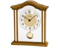 AMS Tafelklok 1174-4 pendule Klok 1174-4 is een tafelklok van massief hout in een eiken kleur met messing en een slinger. Merk AMS
