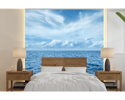Behang - Fotobehang Uitzicht over de blauwe golven op zee - Breedte 280 cm x hoogte 280 cm