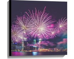 Canvas - Paars Gekleurd Vuurwerk boven Gebouwen in de Stad - 60x60 cm Foto op Canvas Schilderij (Wanddecoratie op Canvas)