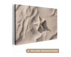Canvas schilderij 120x80 cm - Wanddecoratie Strand - Zeester - Zand - Beige - Muurdecoratie woonkamer - Slaapkamer decoratie - Kamer accessoires - Schilderijen op canvas