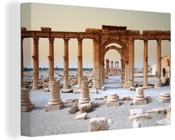 Canvas schilderij 140x90 cm - Wanddecoratie Zuilen en bogen in Palmyra in Syrië - Muurdecoratie woonkamer - Slaapkamer decoratie - Kamer accessoires - Schilderijen