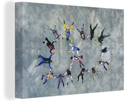 Canvas schilderij 150x100 cm - Wanddecoratie Bovenaanzicht van een groep parachutisten - Muurdecoratie woonkamer - Slaapkamer decoratie - Kamer accessoires - Schilderijen