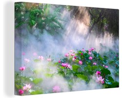 Canvas schilderij 150x100 cm - Wanddecoratie Mist tussen de lotussen bij zonsopkomst in China - Muurdecoratie woonkamer - Slaapkamer decoratie - Kamer accessoires - Schilderijen