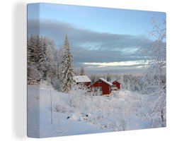 Canvas schilderij 160x120 cm - Wanddecoratie Een cottage in de sneeuw in Zweden - Muurdecoratie woonkamer - Slaapkamer decoratie - Kamer accessoires - Schilderijen