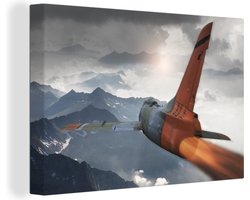 Canvas schilderij 180x120 cm - Wanddecoratie Een straaljager van een leger over de bergen - Muurdecoratie woonkamer - Slaapkamer decoratie - Kamer accessoires - Schilderijen
