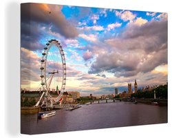 Canvas schilderij 30x20 cm - Wanddecoratie Witte wolkenformatie boven de London Eye in Londen - Muurdecoratie woonkamer - Slaapkamer decoratie - Kamer accessoires - Schilderijen op canvas