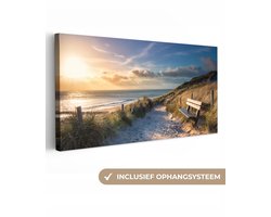 Canvas schilderij 60x30 cm - Wanddecoratie Zonsondergang - Strand - Duin - Gras - Bank - Muurdecoratie woonkamer - Slaapkamer decoratie - Kamer accessoires - Schilderijen op canvas