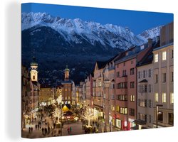 Canvas Schilderij Tirol - Berg - Stad - 120x80 cm - Wanddecoratie