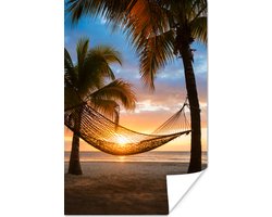 Caribische eilanden met een strand en hangmat Poster 120x180 cm - Foto print op Poster (wanddecoratie woonkamer / slaapkamer) / Zee en Strand XXL / Groot formaat!