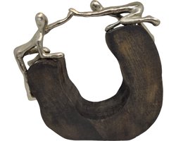 Casablanca - Sculptuur - Beeld - Hout zwart- Staal zilver - De helpende hand
