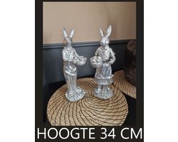 CLAYRE & EEF - BEELD - SET VAN TWEE HAZEN / KONIJNEN (VROUW - MAN) - HOOGTE 34 CM - ZILVERKLEURIG - POLYRESIN - PAASHAAS - PASEN