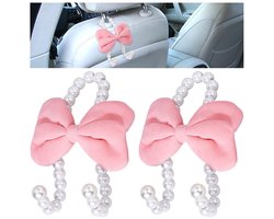 Dailygoods- Autostoel Haak 2 Stuks - Hoofdsteun Hanger - Fluwelen Strik - Roze Decoratie - 11,8x9x4cm - Kunststof Accessoires - Auto Haken