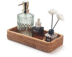 Decoratieve rotan badkameropslagmand voor handdoeken en toiletartikelen