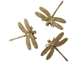 Een set van 3 messing meubelgrepen in de vorm van een libelle, geschikt als wanddecoratie.