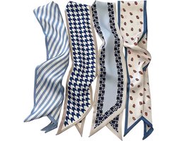 Een set van vier bedrukte satijnen sjaals (blauwe strepen, pied-de-poule, zwart-wit en aardbeienpatroon), delicate decoratieve haarelastiekjes met handvatten van imitatiezijde en damesnekdoeken of handdoeken.
