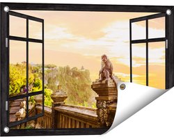 Gards Tuinposter Doorkijk Aap op de Uluwatu Tempel in Bali - 60x40 cm - Tuindoek - Tuindecoratie - Wanddecoratie buiten - Tuinschilderij