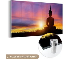 Glasschilderij - Buddha beeld - Silhouette - Zonsondergang - Spiritueel - Schilderijen woonkamer - Foto op glas - Acrylglas - 160x80 cm - Wanddecoratie - Schilderij glas