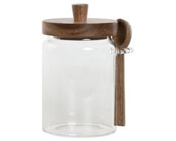 Glazen voorraad pot met een houten deksel en lepel
