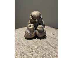 Gouden stenen vogeltjes aan elkaar- beeld- woondecoratie- sfeervol- voorjaar- buiten beeld- tuinbeeld- binnen decoratie