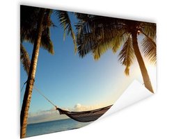 Hangmat tussen palmbomen tropisch strand Poster 160x120 cm - Foto print op Poster (wanddecoratie woonkamer / slaapkamer) / Zeeën en meren Poster / Zee en Strand XXL / Groot formaat!