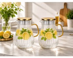 Mevaz Glazen Karaf Set van 2 – 1800 ml per Karaf – Waterkaraf met Deksel en Handvat – Geribbeld Glas – Sapkan voor Water, Sap & IJsthee – Transparant Luxe Design