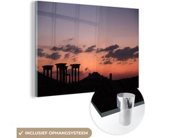 MuchoWow® Glasschilderij 90x60 cm - Schilderij acrylglas - Silhouetten van de zuilen van Palmyra in Syrië - Foto op glas - Schilderijen