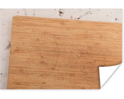 Poster Een houten snijplank op een decoratieve ondergrond - 180x120 cm XXL