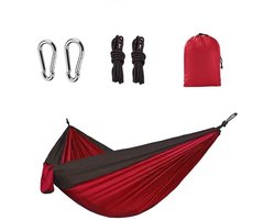 Reishangmat Parachutestof 1 Persoons – Rood - Lichtgewicht hangmat van ademend parachutestof, ideaal voor onderweg. Slechts 550 gram en eenvoudig op te vouwen. Incl. bevestigingsmateriaal. Perfect voor outdoor avonturen en ontspanning.