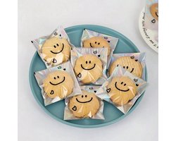 Smiley Uitdeelzakjes - 50 stuks - Iriserend - Uitdeelcadeaus - Traktatie voor kinderen - Transparant cellofaanzakjes
