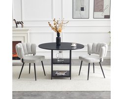 Tafel- en stoelenset: Ronde eettafel van 107 cm met dubbel opbergvak + 2 lichtgrijze eetkamerstoelen met bloemenprint op de rugleuningen van gestructureerde stof. Industriële stijl set, ideaal voor kleine appartementen.