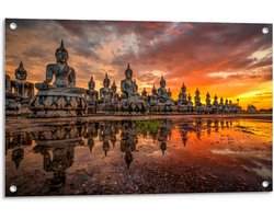 Tuinposter – Rijen Boeddha's bij Oranje Horizon - 90x60cm Foto op Tuinposter  (wanddecoratie voor buiten en binnen)