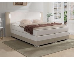Vente-unique [NEW VERSION]Set boxspring hoofdbord met led-verlichting + bedbodems + matras + topmatras ASTI van YSMÉE - 180 x 200 cm - Kunstleer - Crème en wit L 233 cm x H 120 cm x D 219 cm