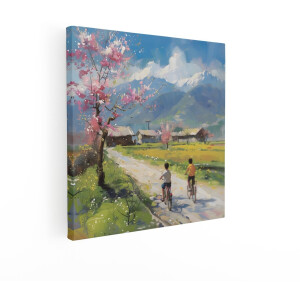 Artaza Canvas Schilderij Twee Jongens Fietsen door een Dorp met Bloeiende Kersenbomen en Bergen - 70x70 cm - Wanddecoratie Woonkamer - Schilderijen - Muurdecoratie
