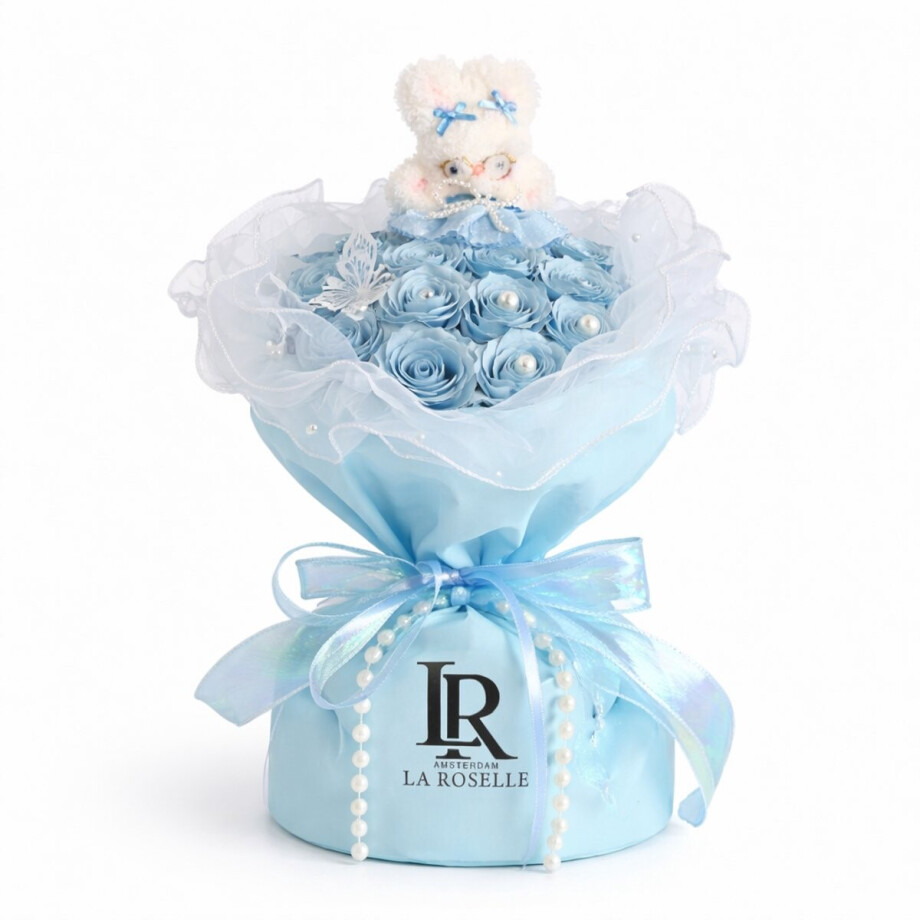 Rozen boeket met decoratieve afwerking, sierlint en teddybeer. Elegante bloemdecoratie geschikt als cadeau of als stijlvolle toevoeging aan woon- of slaapkamerinterieur. afbeelding 1