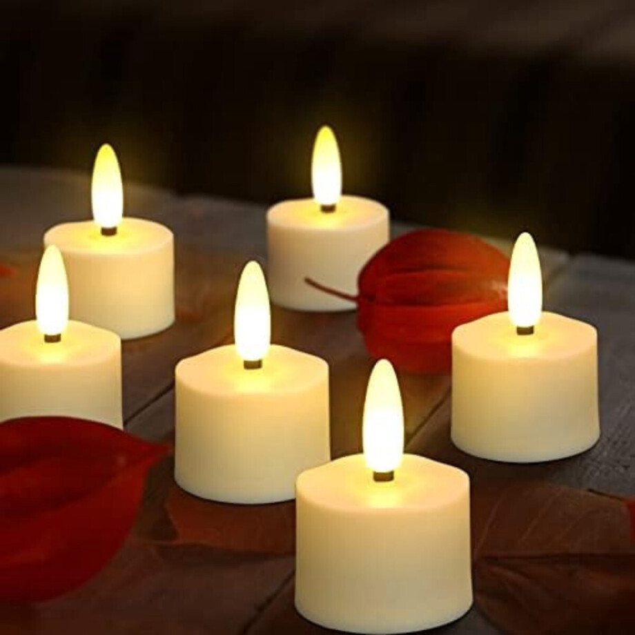 Oplaadbare waxinelichtjes - LED Waxinelichtjes - 12 stuks - Met afstandsbediening - Oplaadbare kaarsen - Oplaadbare theelichtjes Oplaadbare waxinelichtjes - LED Waxinelichtjes - 12 stuks - Met afstandsbediening - Oplaadbare kaarsen - Oplaadbare theelichtjes afbeelding 1