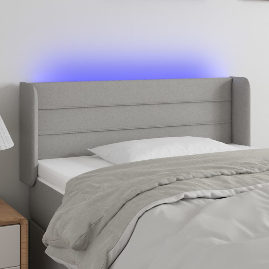 vidaXL Hoofdbord LED 83x16x78/88 cm stof lichtgrijs afbeelding 1