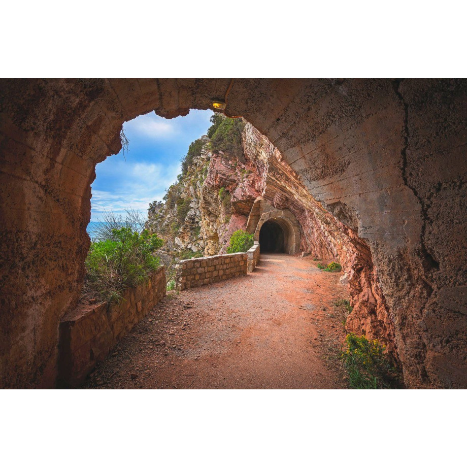 Papermoon Fotobehang Tunnel in de berg Petrovac Bay Vliesbehang, eersteklas digitale print afbeelding 1