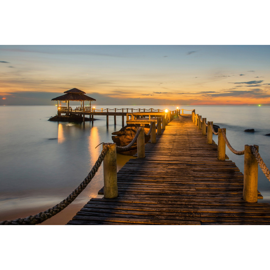 Papermoon Fotobehang Wooded bridge pier between sunset afbeelding 1