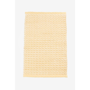 Gele badmat met patroon