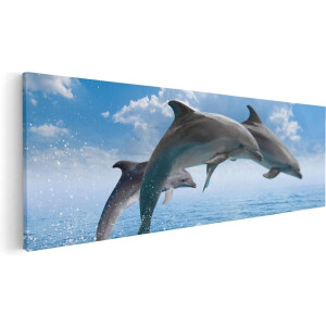 Artaza Canvas Schilderij Dolfijnen Springen uit de Blauwe Zee - 60x20 - Foto Op Canvas - Canvas Print