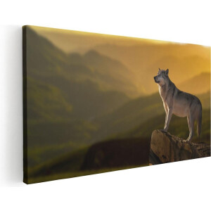Artaza Canvas Schilderij Wolf Op Een Rots Met Een Heuvel Landschap - 60x30 - Foto Op Canvas - Canvas Print